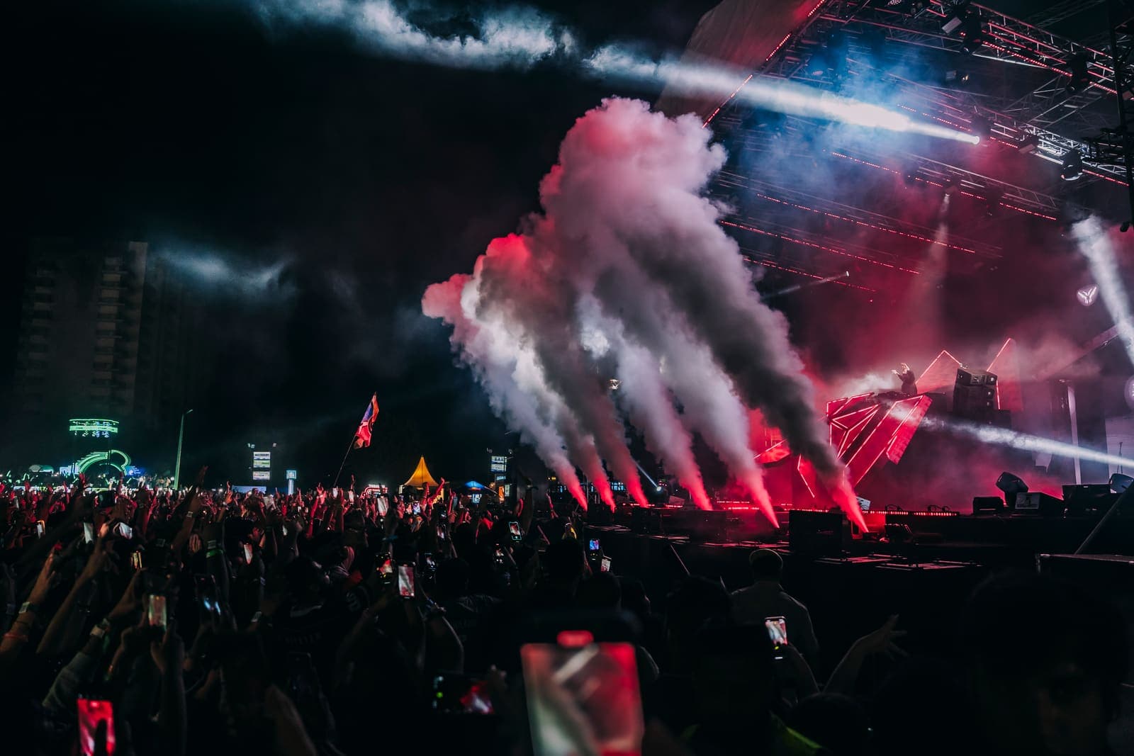 Night festival with lasers and smoke