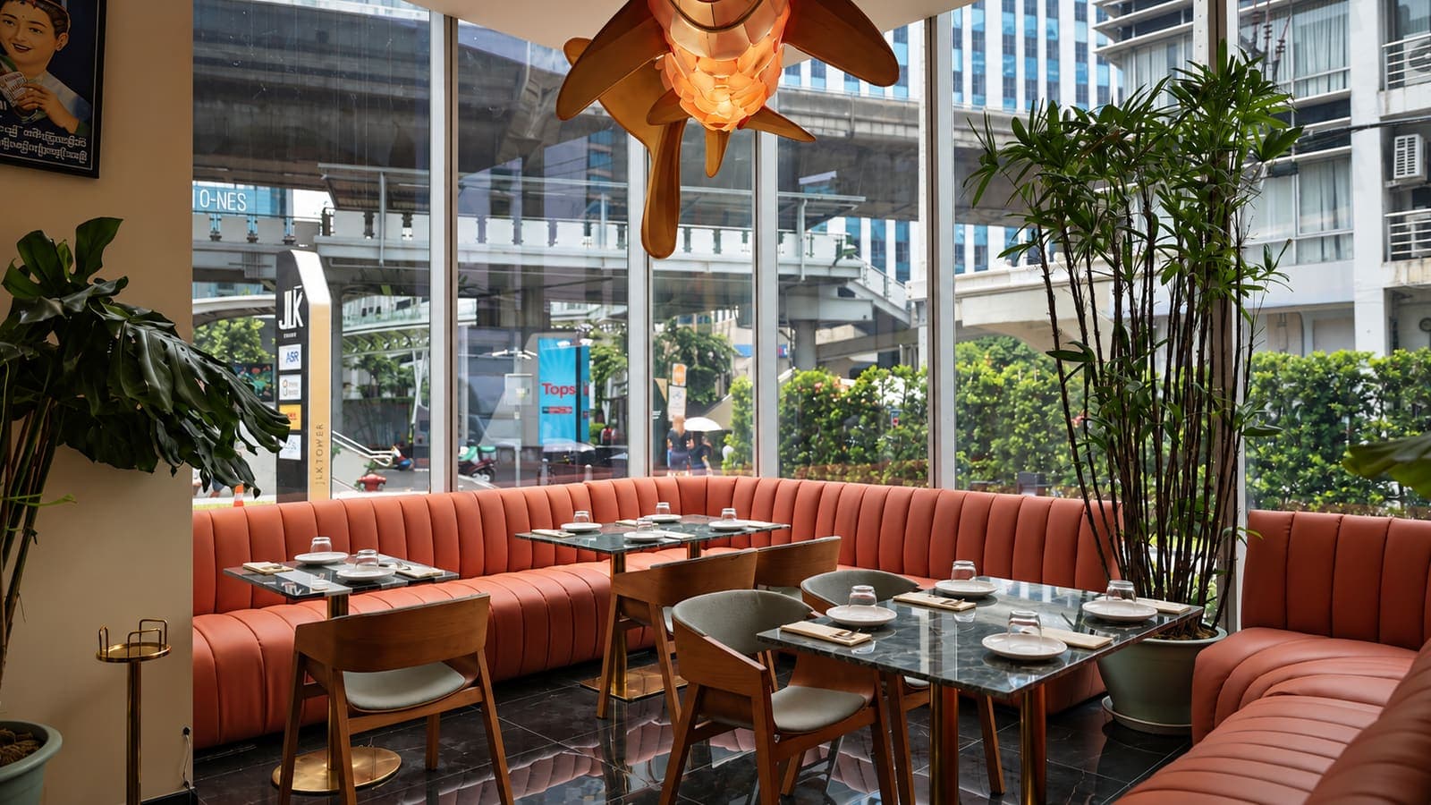 Modern dining room with terracotta banquettes
