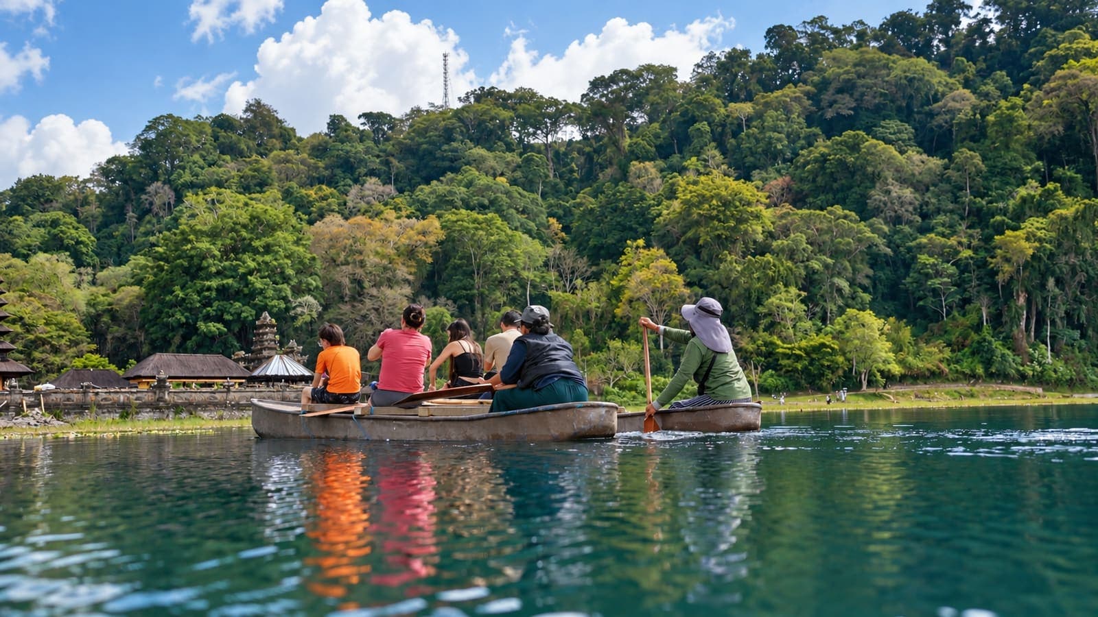 Traditional canoe on a jungle-fringed lake