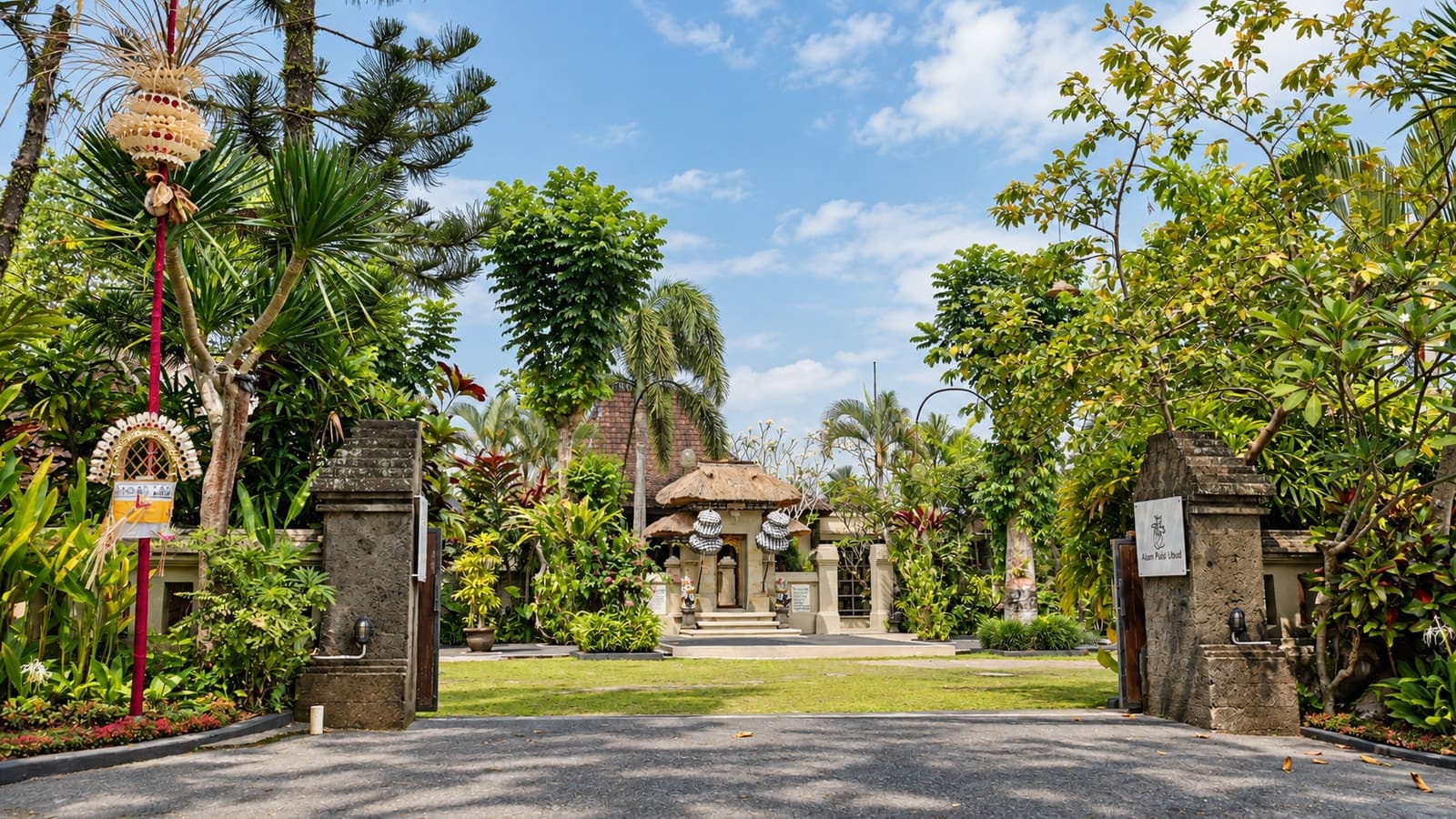 Lush tropical entrance to a Balinese resort